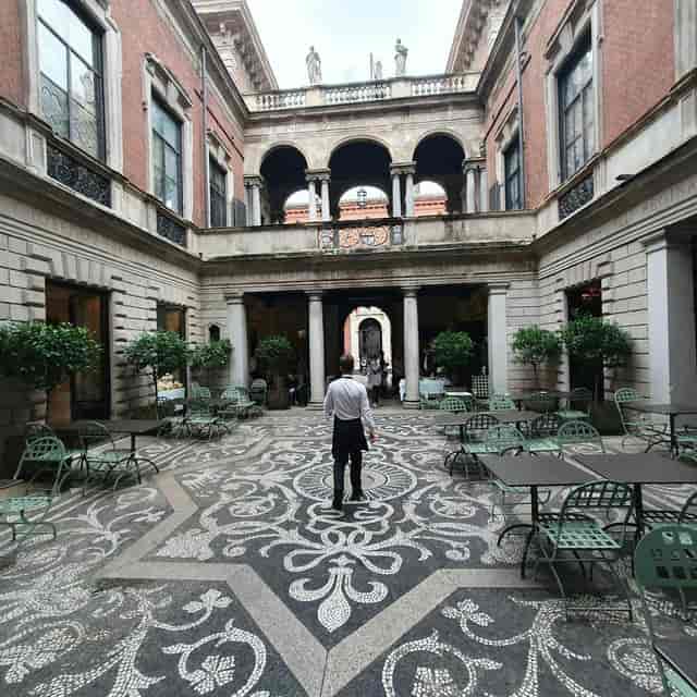 Historic courtyard at Il Salumaio di Montenapoleone for sophisticated cocktail reception or brunch.