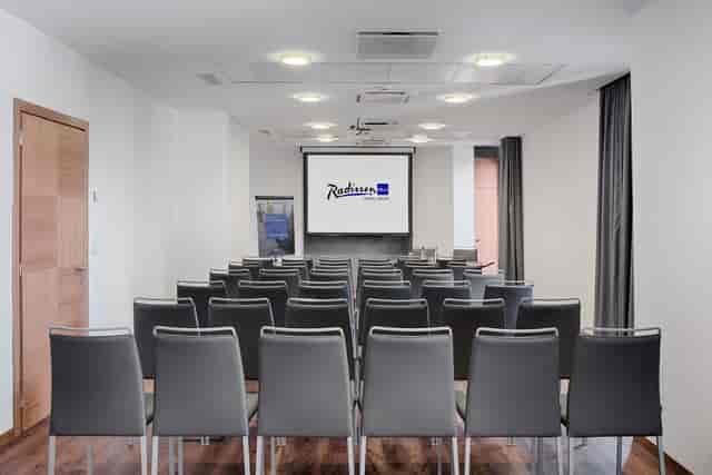 Theater-style meeting room at Napoleon Hotel for corporate training and professional presentations.