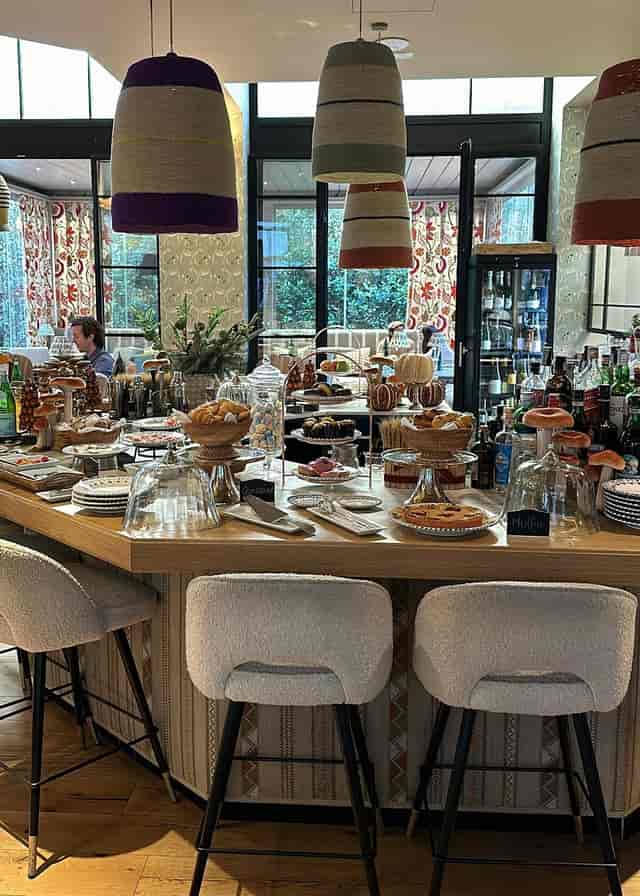 Luxury VMaison Hotel tiered bar setup for corporate events and catering.