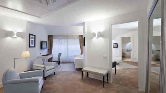 Luxury VMaison hotel suite for VIP hosting and executive event breakouts.