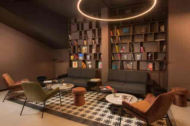 Sophisticated NH Milano breakout room for networking and brainstorming events.