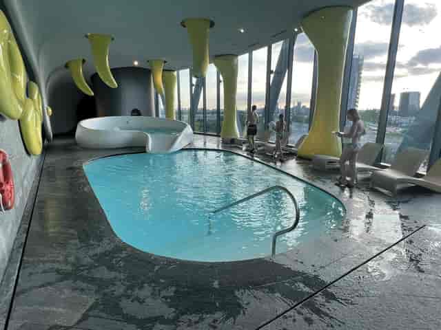 Avant-garde indoor pool at voco Milan-Fiere for executive retreats and VIP incentive travel.