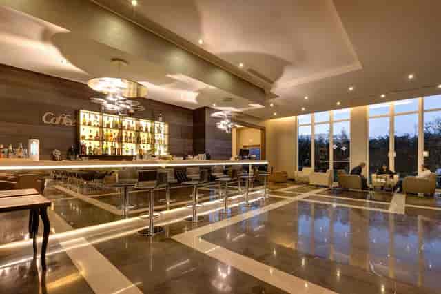 Upscale lounge at Klima Hotel Milano for corporate networking and evening reception events.