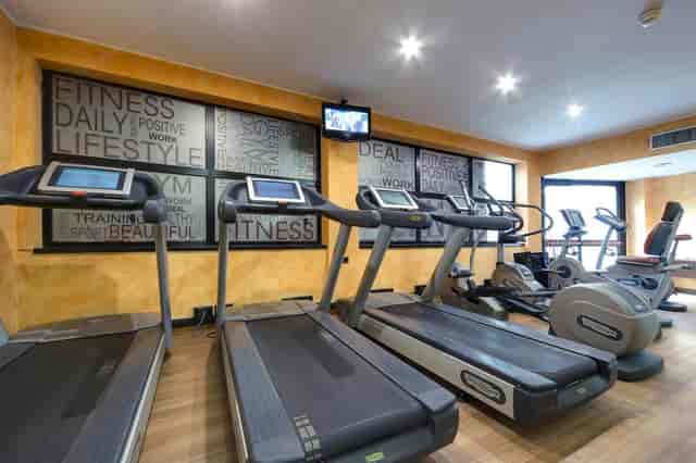 Hotel Melià fitness center with modern equipment for corporate travel and business events.