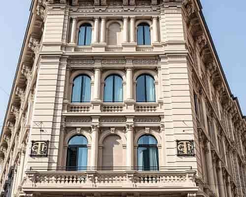 Luxury Radisson Collection Palazzo suite, heritage architecture for corporate retreats and meetings.