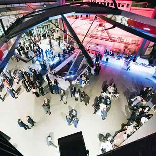 Industrial-chic event venue with lounge seating for corporate networking and experiential events.