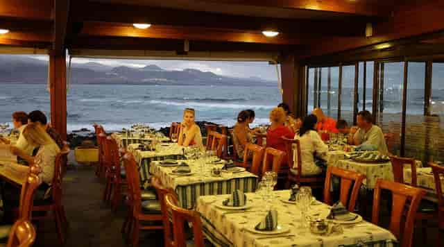 Corporate dinner venue with panoramic ocean views for event hosting and client receptions.
