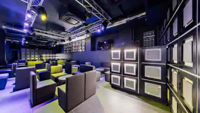 Modern industrial lounge at Impossible Inside for corporate networking and breakout events.