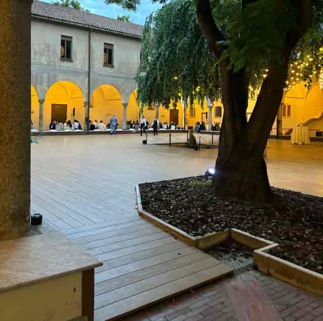 Historic Giardino dei Platani courtyard with string lighting for cocktail reception or wedding.