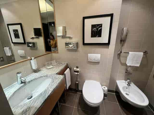 Modern Starhotels Tourist bathroom with bidet, ideal for business travel and hotel accommodation.