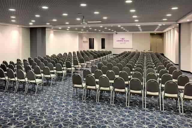 Theater-style meeting room setup at Crowne Plaza Milan Linate for corporate presentations.