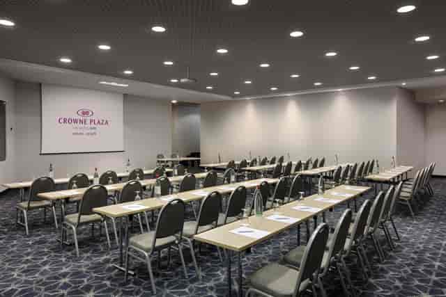 Classroom-style meeting room at Crowne Plaza Milan Linate for corporate training and workshops.