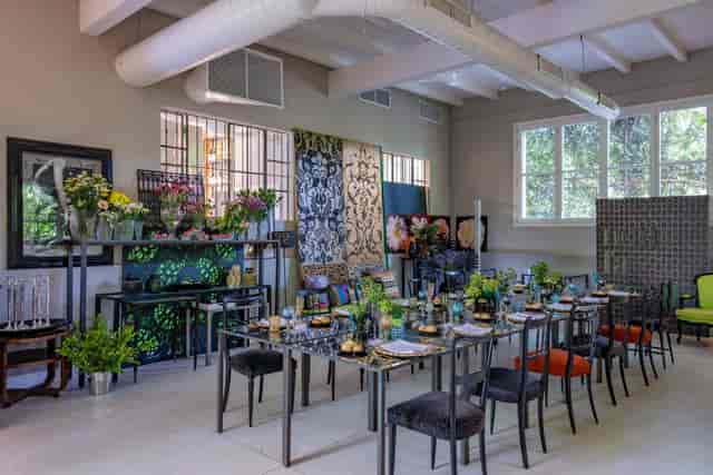 Industrial-chic Garden House Milano boardroom for luxury corporate dinners and boutique workshops.