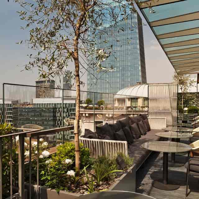 Luxury rooftop lounge for executive receptions and networking cocktail events.