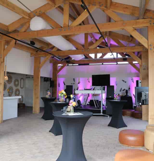 Rustic-chic Beach House event space with LED lighting for cocktail receptions and corporate parties.