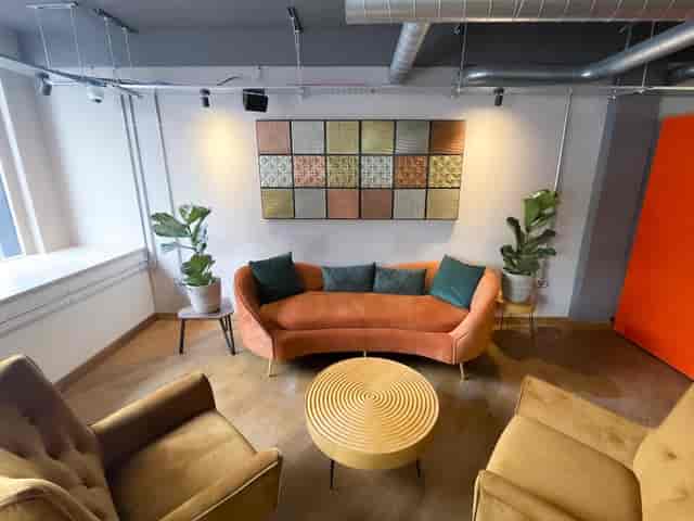 Industrial-chic breakout space at The Lower Deck for networking and corporate events.