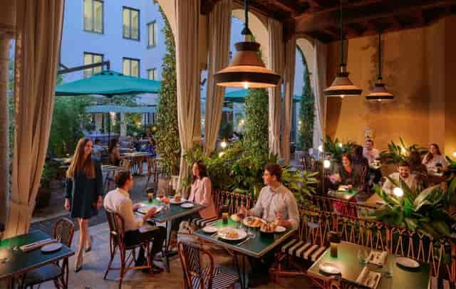 Mandarin Garden terrace: upscale biophilic event venue for networking and corporate dinners.