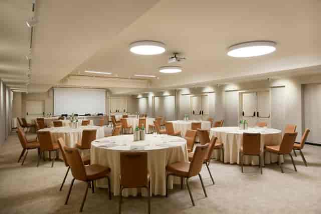 Banquet-style meeting room at Starhotels Ritz for corporate workshops and breakout sessions.