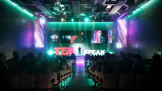Dynamic conference at International Convention Centre, Olympia with engaging visuals and tech focus.