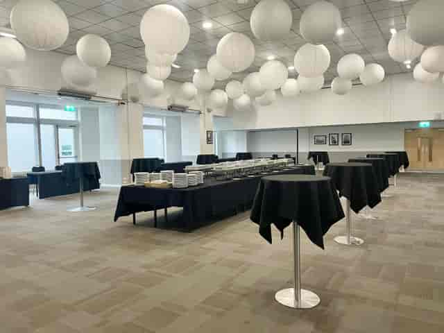GMB Banqueting Hall event space with modern paper lanterns for corporate networking and buffet.