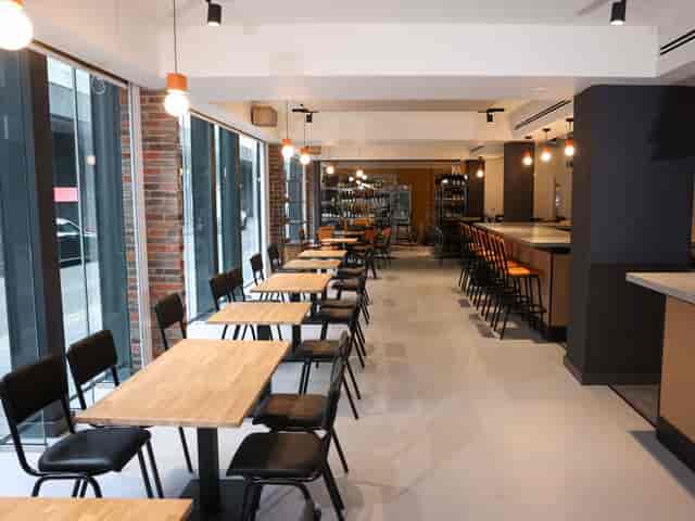 Higher Ground industrial-chic venue for networking events and workshops with natural light.