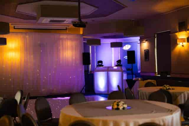 Function room at North Manchester Golf Club with starlight stage for evening wedding receptions.