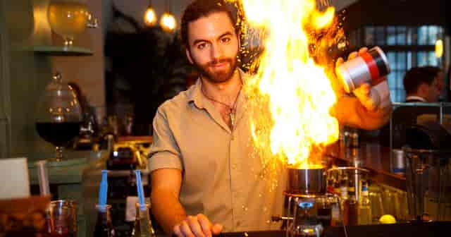 The Alchemist cocktail bar: experiential catering for corporate event and luxury reception.