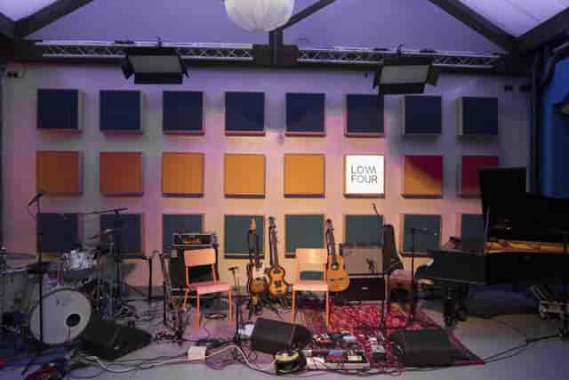 Live room at Low Four Studio with truss lighting for intimate live music performance and events.