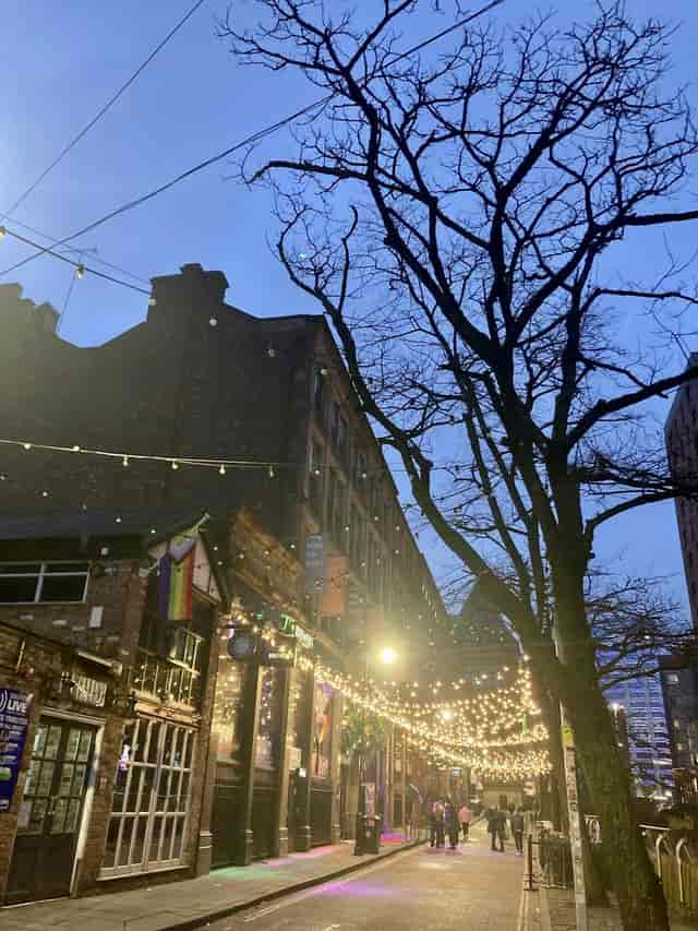 Outdoor lounge at The Brewers Manchester with string lights for evening receptions and networking.