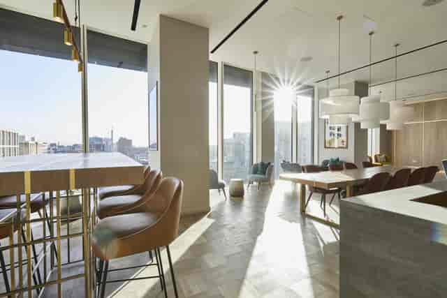 Premium high-ceilinged private dining space for executive workshops and networking events.