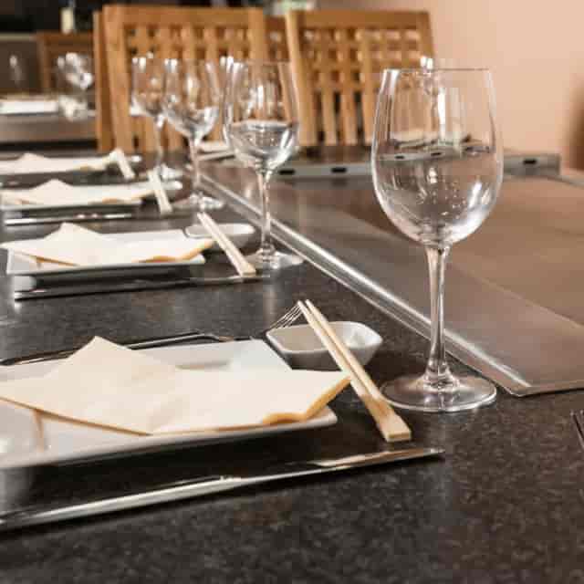 Teppanyaki table set for a corporate dinner in Chinatown, perfect for small group events.