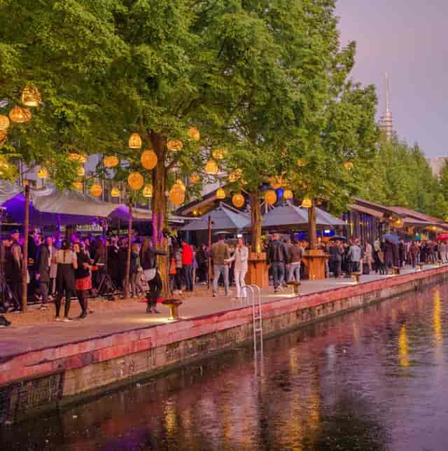Jetty Bar waterfront networking event with ambient lighting for corporate reception.