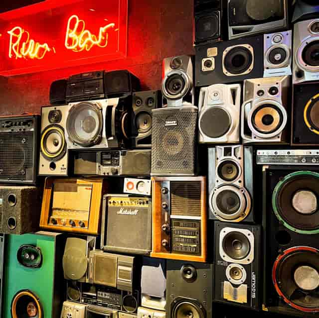 Private seating area with vintage audio equipment for creative music events in Manchester.