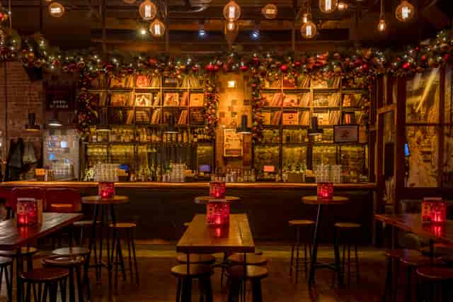 Ground Floor at Old Street Records, festive venue with string lights for holiday parties.
