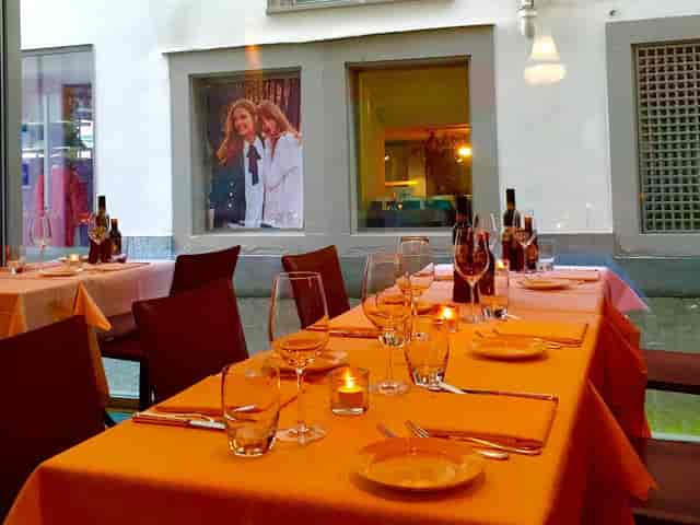 Intimate banquet dinner at Haus zum Rüden with warm ambient lighting for private event hosting.