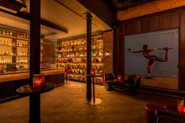 Sophisticated Eastcheap Records lounge with bar for cocktail receptions and networking events.