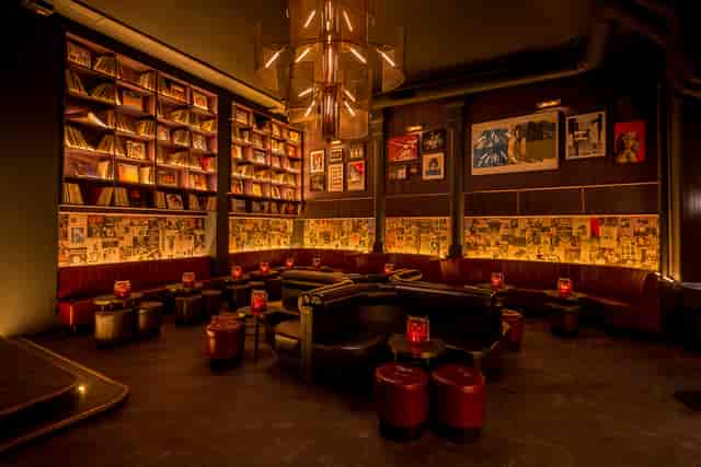 Backstage at Eastcheap Records: moody booth seating for an intimate evening networking reception.