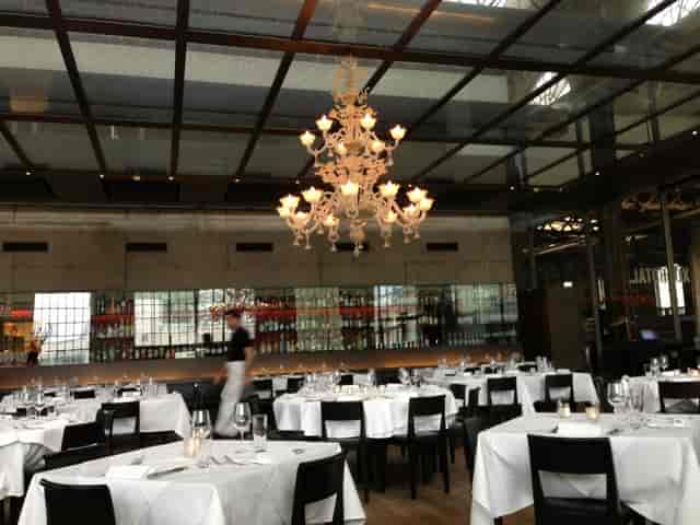 Industrial-chic bar at LaSalle Restaurant, ideal for elegant corporate dinners and gala events.