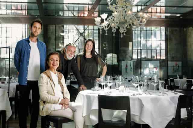 Upscale LaSalle restaurant with industrial decor, ideal for corporate events and social hosting.