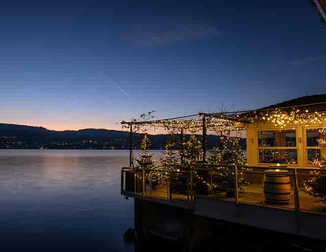 Raclette Chalet Zurich: Cozy waterfront venue for holiday mixers and evening corporate receptions.