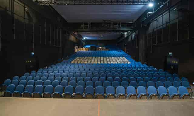 MAAG Halle black-box auditorium with tiered seating for corporate events and theater productions.