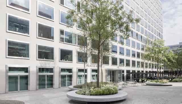Modern Placid Boutiquehotel Zürich courtyard, outdoor networking venue, professional event space.
