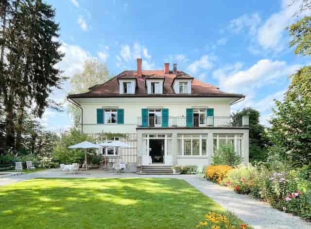 Veranda at Signau House Zurich: elegant garden venue for executive retreats and boutique weddings.