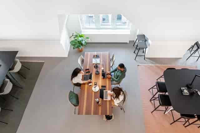 Coworking space at Spaces Seefeld with boardroom table for collaborative meetings and networking.