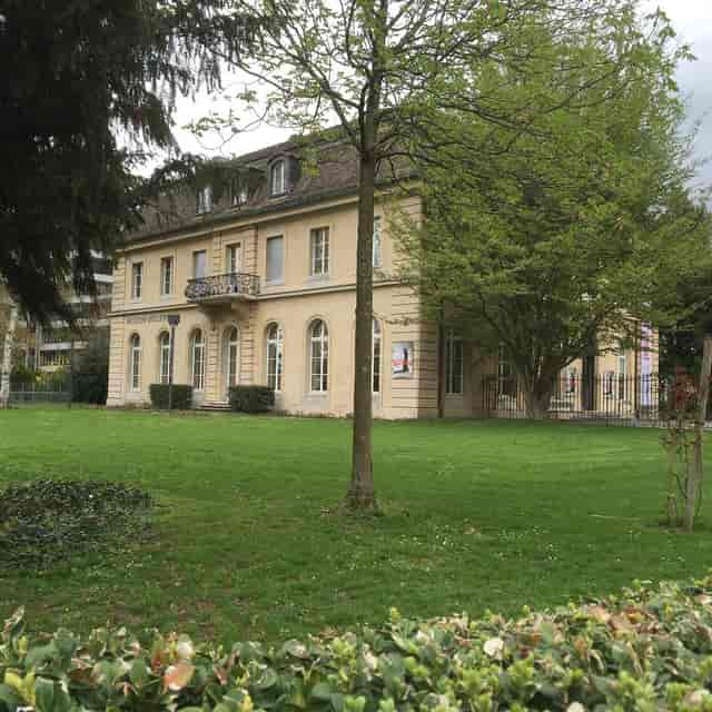 Historic ZAZ Bellerive function room with lawn for corporate retreats and outdoor event receptions.