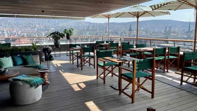 High-end rooftop bar with city views for corporate networking and premium event hospitality.