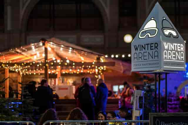 Kir Royal winter arena pop-up bar with warm lighting for seasonal event venue hire.