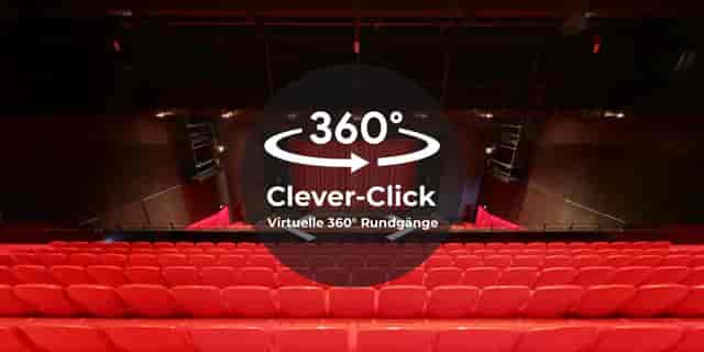 Theater11 venue with stage seating, ideal for corporate conferences and event planning.