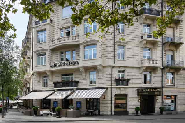 Upscale rooftop terrace at boutique hotel for executive breakouts and networking events.