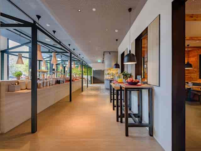 Modern Mercure Zurich City breakout area for corporate events and networking.